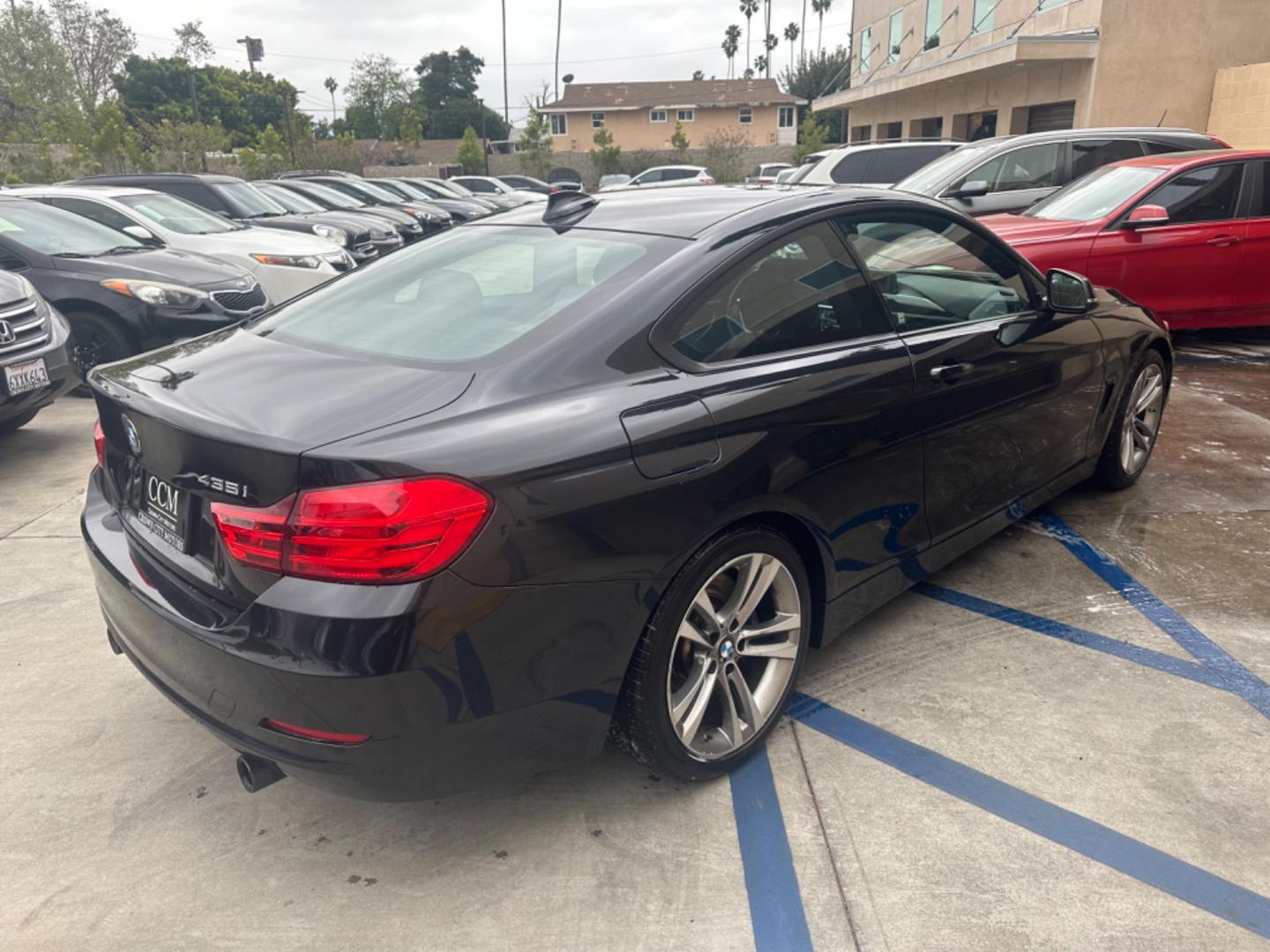 2015 Black BMW 4-Series 435i coupe (WBA3R1C55FK) with an 3.0L V6 DOHC 24V engine, 8-Speed Automatic transmission, located at 30 S. Berkeley Avenue, Pasadena, CA, 91107, (626) 248-7567, 34.145447, -118.109398 - Crown City Motors is a used “Buy Here Pay Here” car dealer in Pasadena CA. “Buy Here Pay Here” financing, means that when you purchase your vehicle from our dealership, that you make the payments to the dealership as well. We do not need the banks approval to get you approved for a used auto - Photo#4